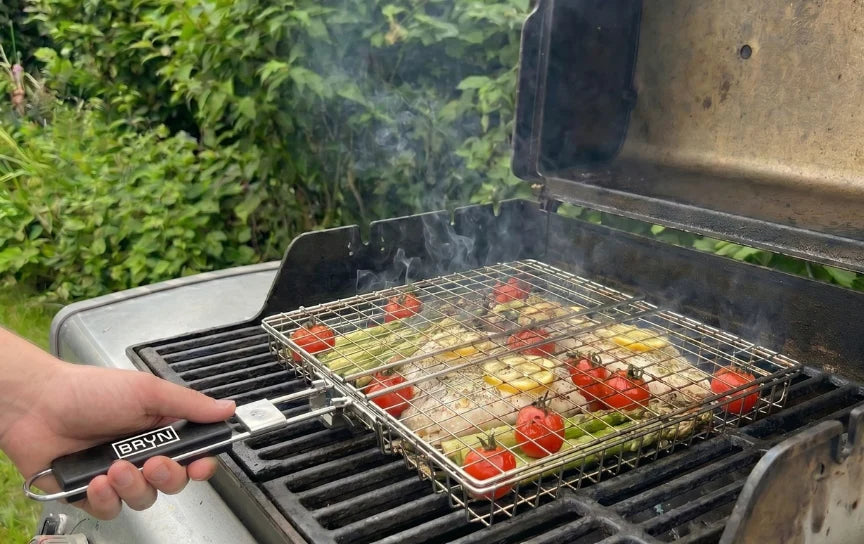 Placing the grill basket on the grill